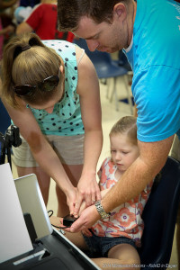 Child being fingerprinted during KidsID Event