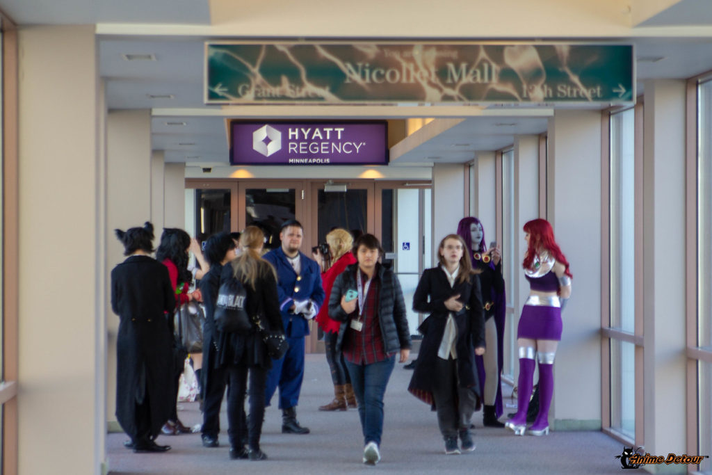 Cosplayers and convention attendees in the skyway connecting the Hyatt Regency and Millennium hotels