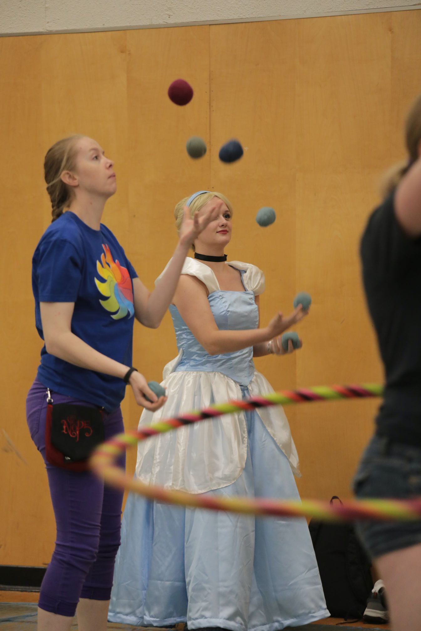 Cosplayers juggling